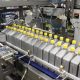 side load case packer for containers