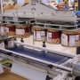 Robotic pick and place top load case and tray packing machine